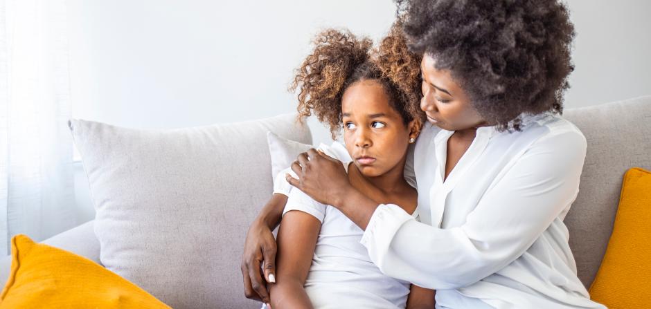 mother and daughter on couch